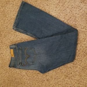 Vintage Levi's Jean's with custom distressing and embroidery. Baby bell bottom.